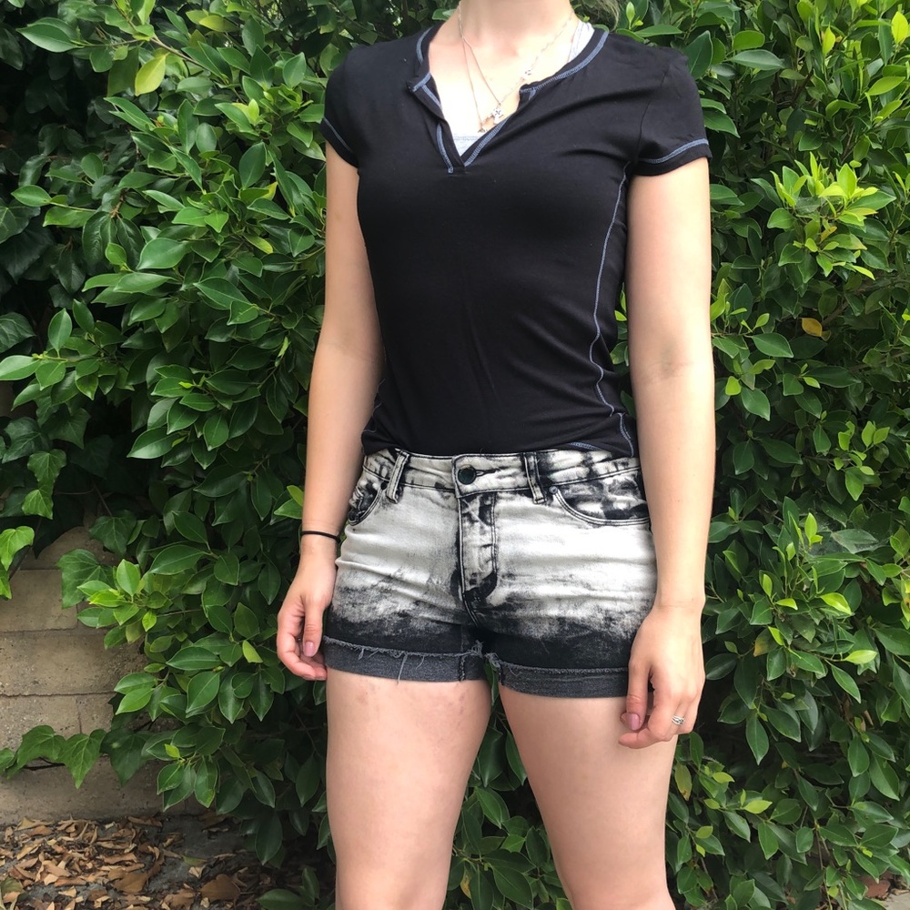 Black and white cuffed UO denim shorts